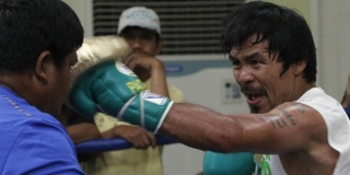 Dünyanın ən çox qazanan idmançısı filipinli boksçu oldu